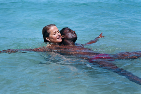 Ellen (Charlotte Rampling) teaches 
Legba (Mnothy Cesar) how to swim
Photo: Shadow Distribution