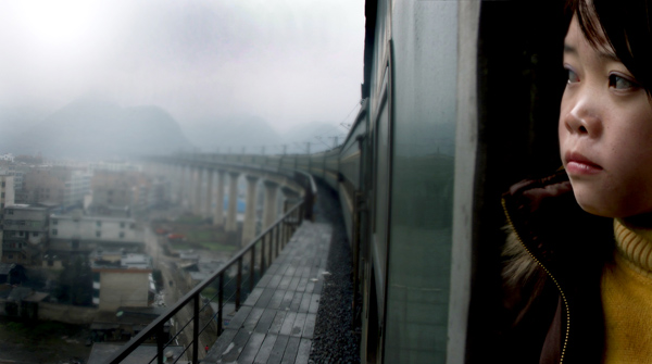 Zhang Qin in LAST TRAIN HOME (Photo: Zeitgeist Films)