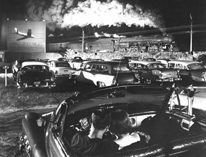 O. Winston Link's photo of a
drive-in theatre with a steam 
locomotive in the background
Photo:  O. Winston Link