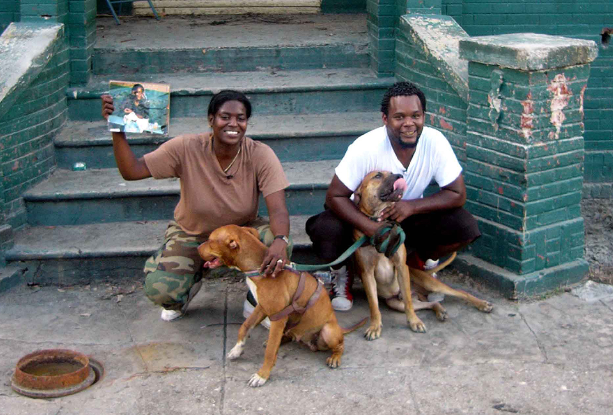 Kimberly Roberts and Scott Roberts outside their
flood damaged home in New Orleans (Photo: Zeitgeist Films)